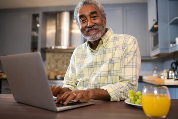 istock Portrait of senior man using laptop computer 847991552