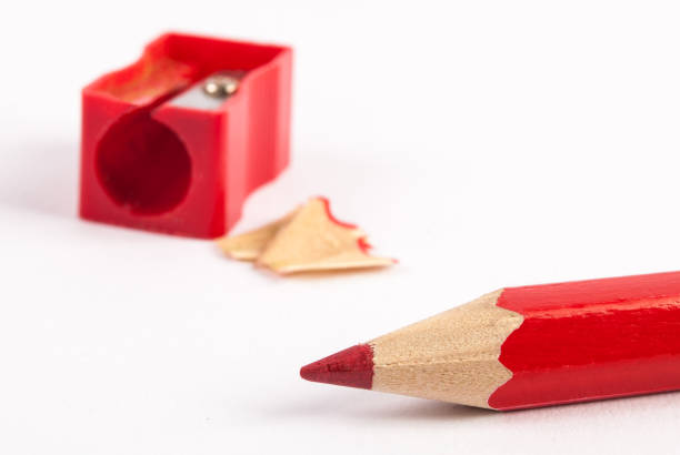 istock Pencil sharpener and red wooden pencil on white background 848013358