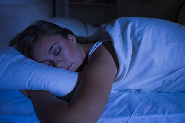 istock Blonde woman sleeping at night 848020520