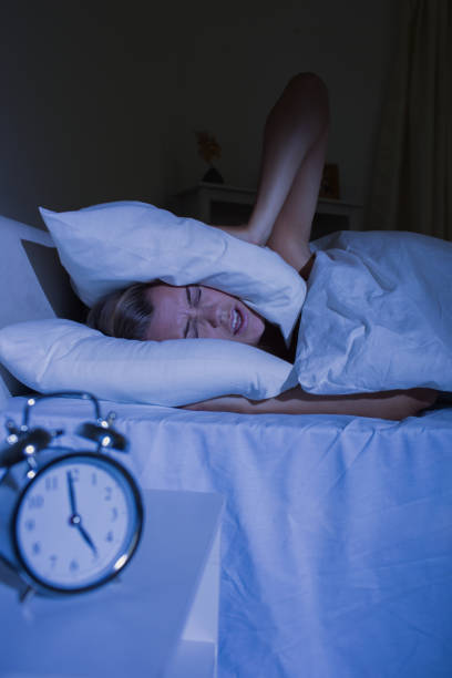 istock Offended woman putting pillows on her ears 848020900