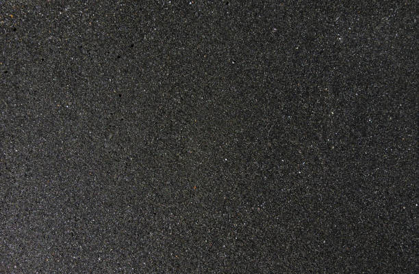istock the texture of black sand, concept background, natural background 848037118