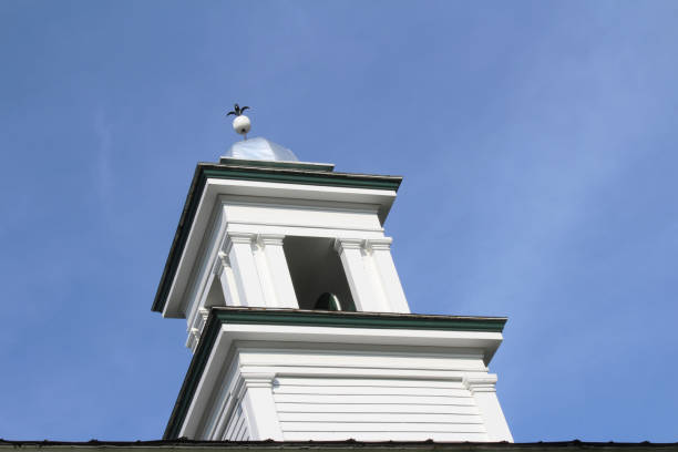 istock Silver domed bell tower cupola in white trimmed in green 848047322
