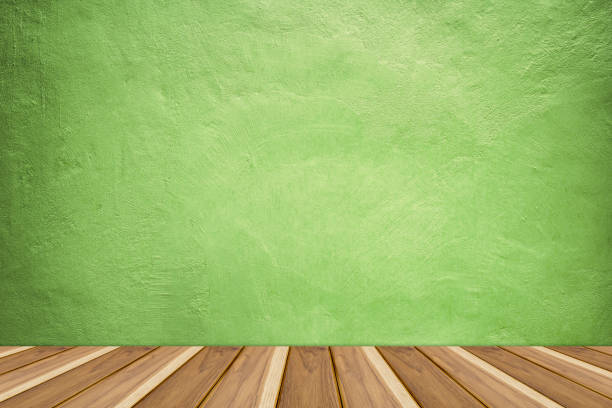 istock Green Concrete texture backdrop with wooden shelf 848048246