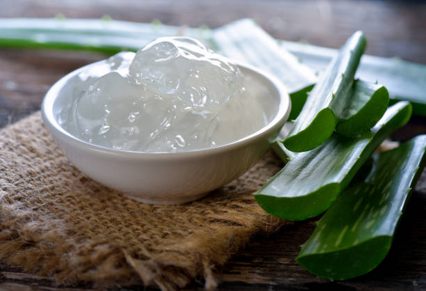 istock aloe vera gel in bowl with on wooden table 848054644