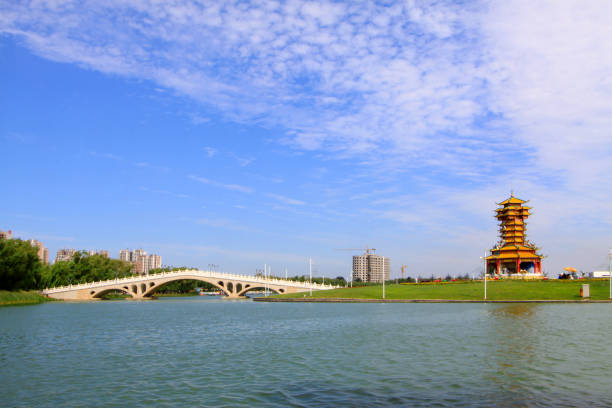 istock bridge and tower landscape in a park, north china 848086338