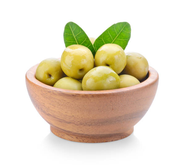 istock green olives in wood bowl on a white background 848093004