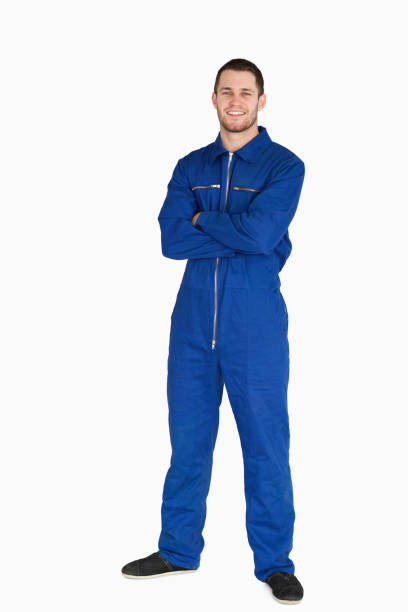 istock Smiling young mechanic in boiler suit with arms folded 848106004