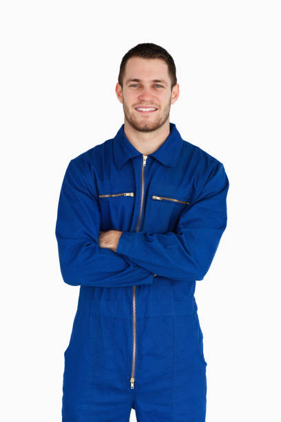 istock Smiling mechanic in boiler suit with folded arms 848107124