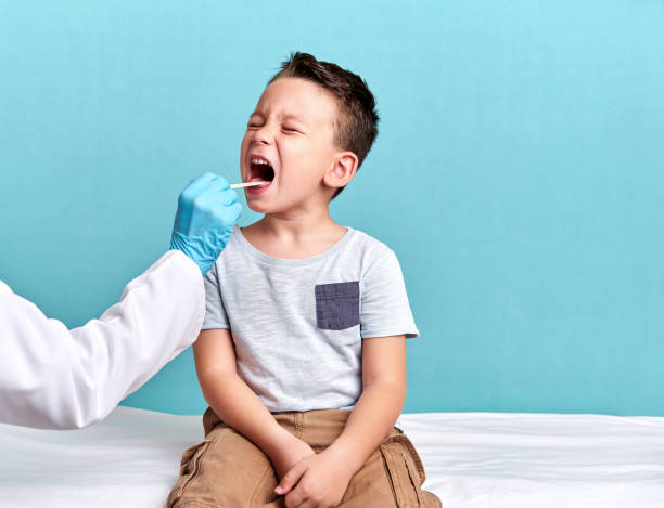 istock Pediatric doctor examining little patient 848107638