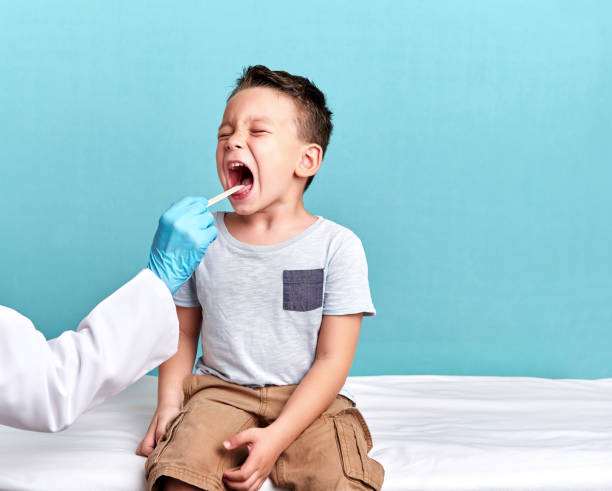 istock Pediatric doctor examining little patient 848107854