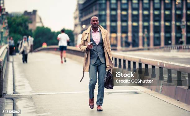 Walking To Work With A Coffee In Hand Stock Photo - Download Image Now -  High Net Worth, Real People, People - iStock