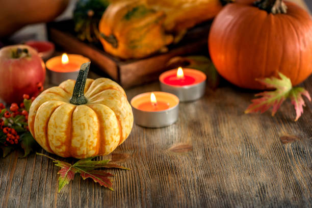 istock Autumn table setting with pumpkings and candles, fall home decoration for festive dinner 848111506