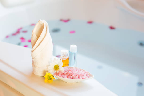Soft and select focus Spa massage compress balls, herbal ball and treatments spa decoration, natural organic products on a bathtube.; Spa Thailand. stock photo