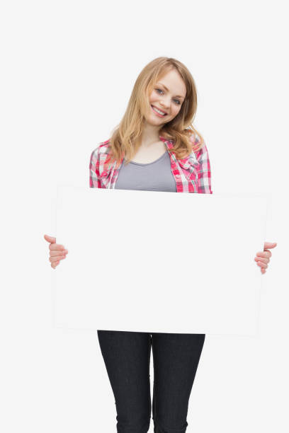 istock Woman holding a blank board 848118862
