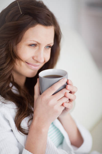 istock Woman holding a mug of coffee 848119406