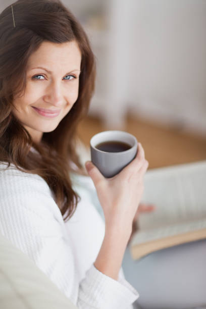 istock Woman holding a coffee mug 848121864