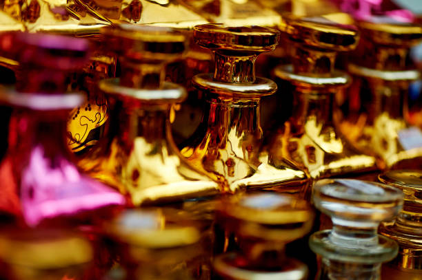 istock Glass perfume bottles based oils.A Bazaar, market. Macro. Gold and pink gamma 848122076