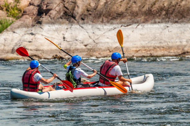 rafting. - sports team sport rowing teamwork rafting imagens e fotografias de stock