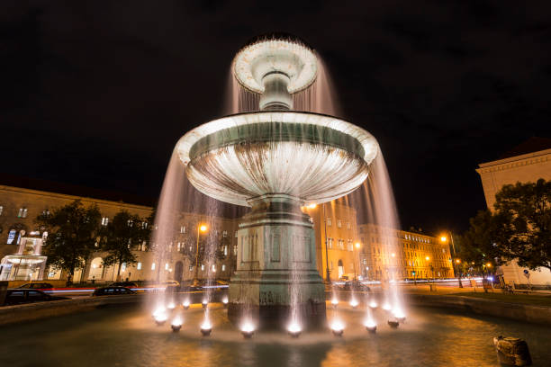 istock Illuminated fountain in downtown Munich, Germany 848143532