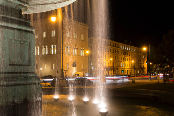 istock Illuminated fountain in downtown Munich, Germany 848143584