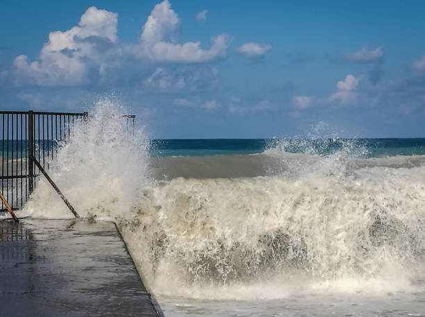 istock High wave with cloud of splash on beach in Sochi 848149770