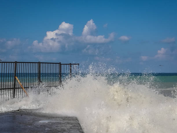 istock High wave with cloud of splash on beach in Sochi 848149916