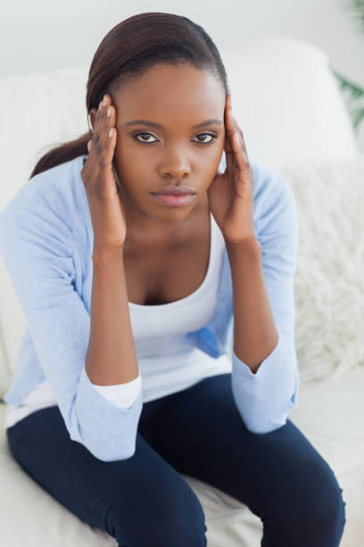 istock Black woman putting hands on temples 848153304