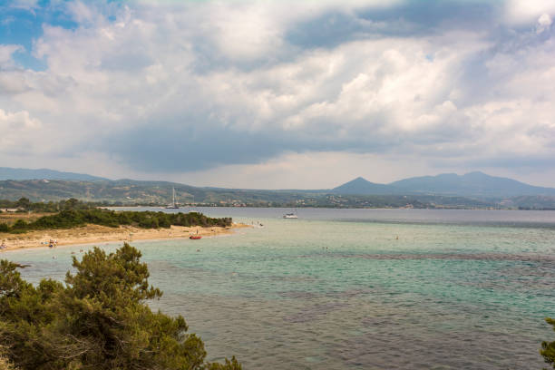 Golden Beach Divari, Gialova, Greece. North of Pylos, pass through Gialova and turn left at the sign for Golden Beach (also known as Divar Beach).