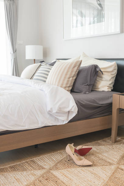 istock white blanket with set of pillows on bed 848166768