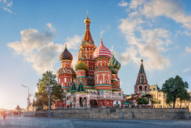 clouds in the blue sky over Cathedral St. Basil's Cathedral on Red Square in Moscow and the clouds in the blue sky st basils cathedral stock pictures, royalty-free photos & images