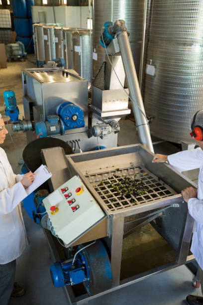 istock Workers working together near production line 848178022