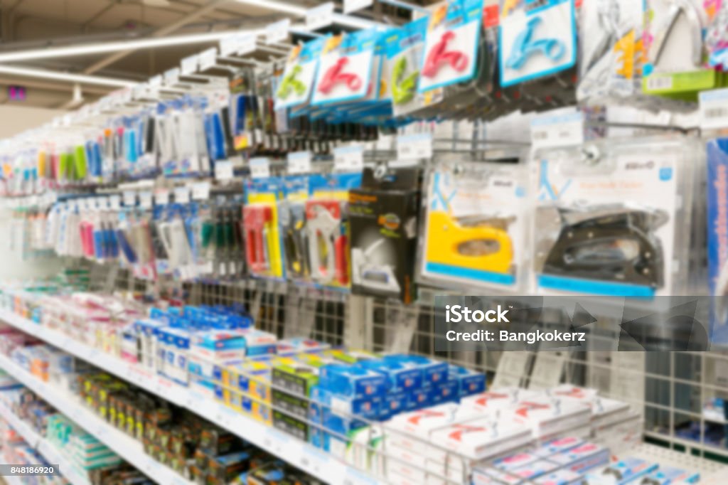 Blurry Background of the shelves of office equipment at the mall. Office Supply Stock Photo