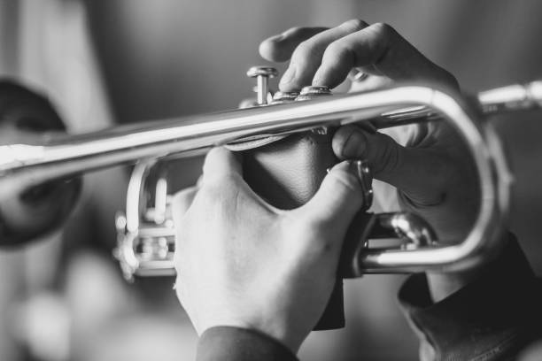 istock man plays the trumpet 848196396