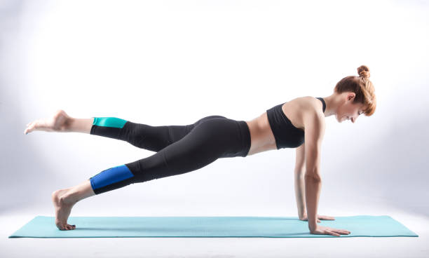 istock A pilates teacher on the mat 848205882