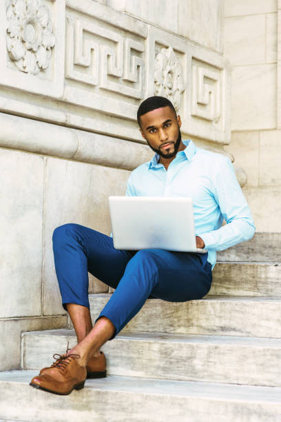 istock Young African American Man with beard studying in New York 848208936
