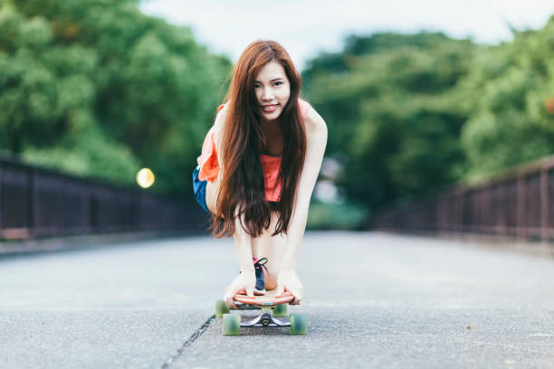 istock Young Woman riding Skateboard 848209162
