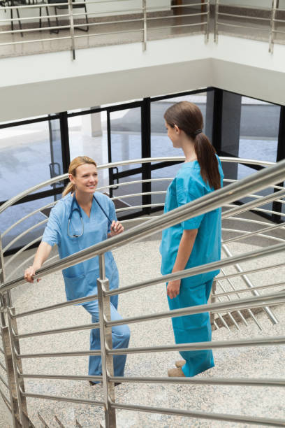 istock Two nurses standing opposite each other in the stairwell 848209164