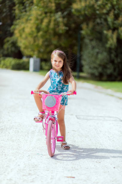 istock Young girl riding a bike 848217214