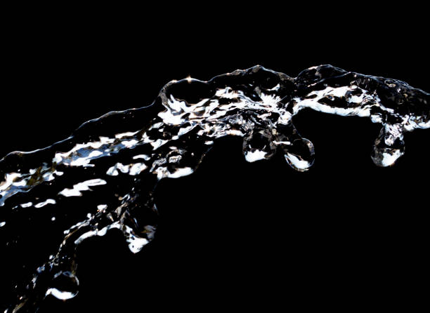 istock stream of water on a black background 848221280