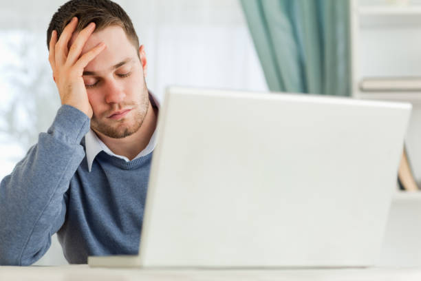 istock Businessman annoyed by his notebook in his homeoffice 848226500
