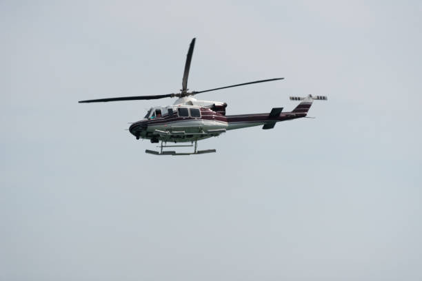 istock Helicopter in the sky on a cloudy day 848226860