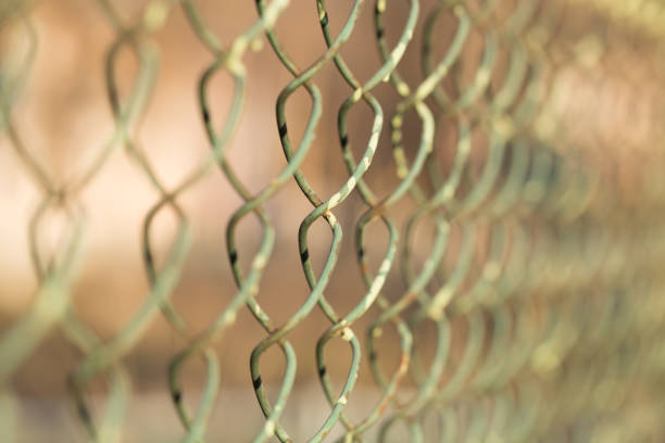 istock metal fence with mesh 848227166