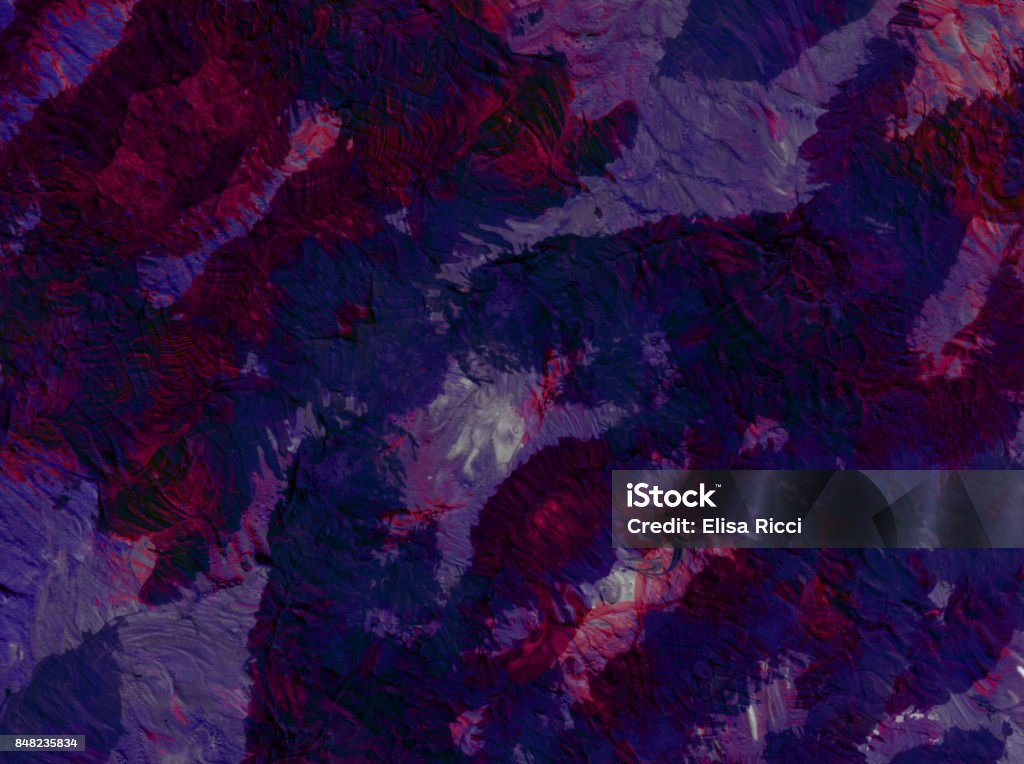 Abstract background with acrylic colors in dark shades of blue and purple An abstract background ideal for multiple uses. Acrylic paints stratify and create a pattern in dark shades of blue and purple. Abstract Stock Photo