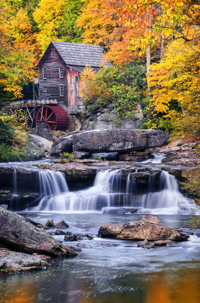 istock Gristmill and autumn foliage 848236030