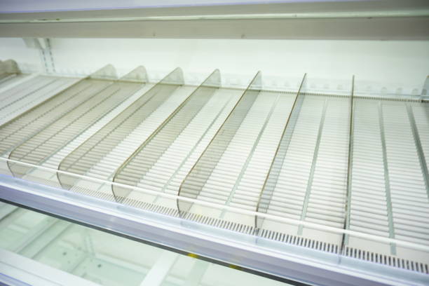 istock Empty, brightly-lit aisle in large supermarket 848263766