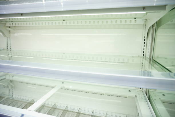 istock Empty, brightly-lit aisle in large supermarket 848263964
