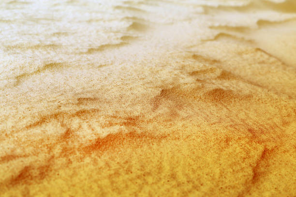 istock Beautiful texture of yellow sand 848284898