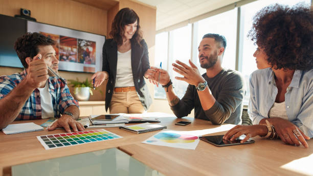 group of multi ethnic people during business meeting - store indoors design advertisement imagens e fotografias de stock