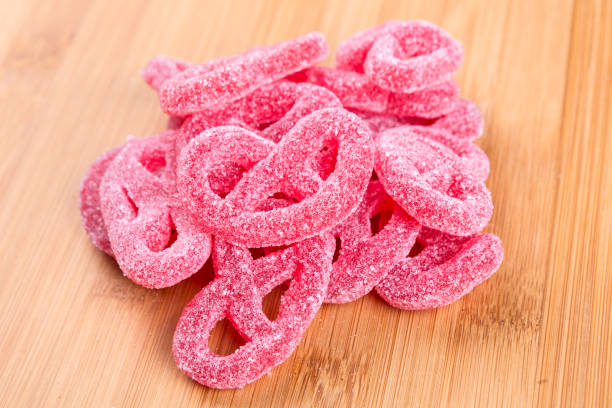 istock Fruit flavored jelly pretzel on a wood background 848291322