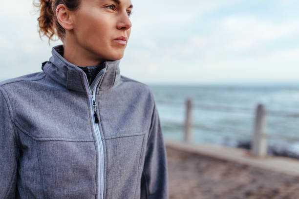 istock Young woman relaxing after exercise outdoors 848296204